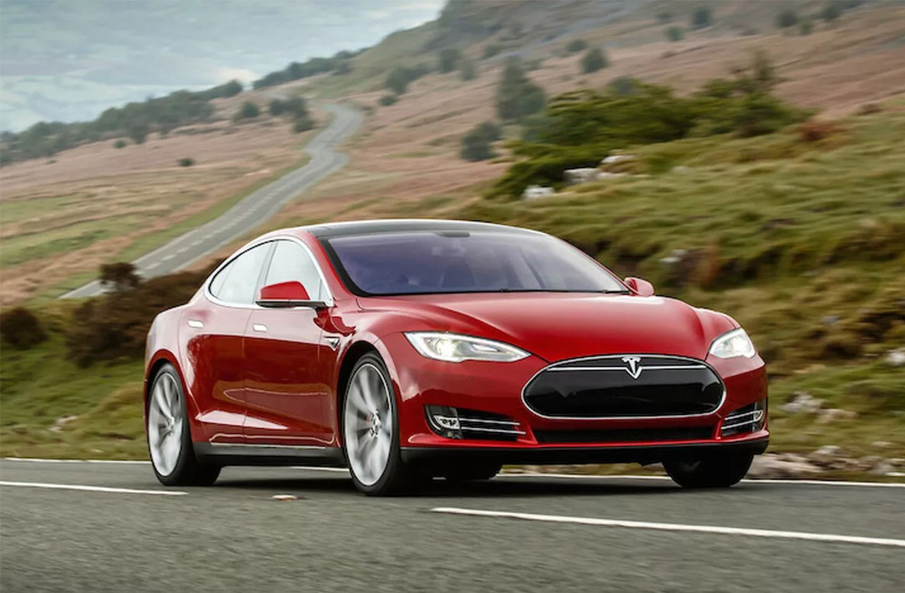 Tesla reports record profit